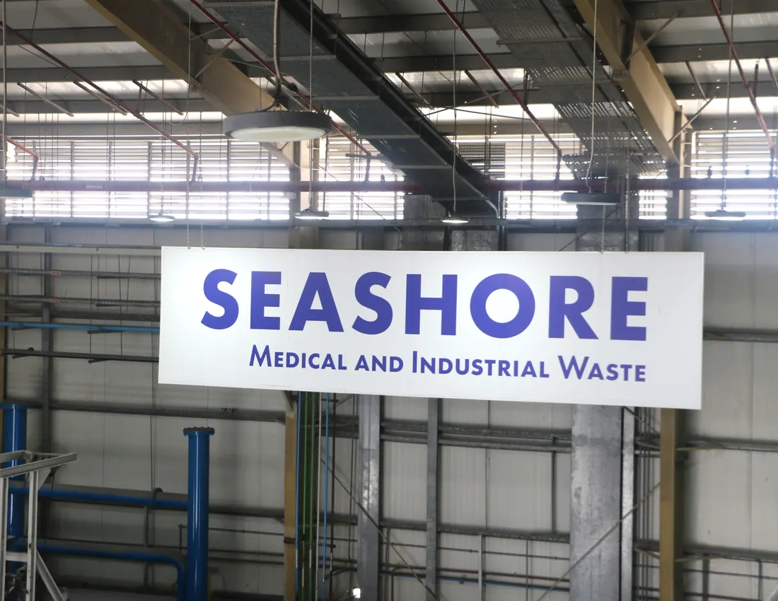 Seashore Medical and Industrial Waste sign inside the treatment hall in Mesaieed